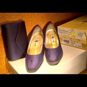 Blue pumps with matching clutch purse.